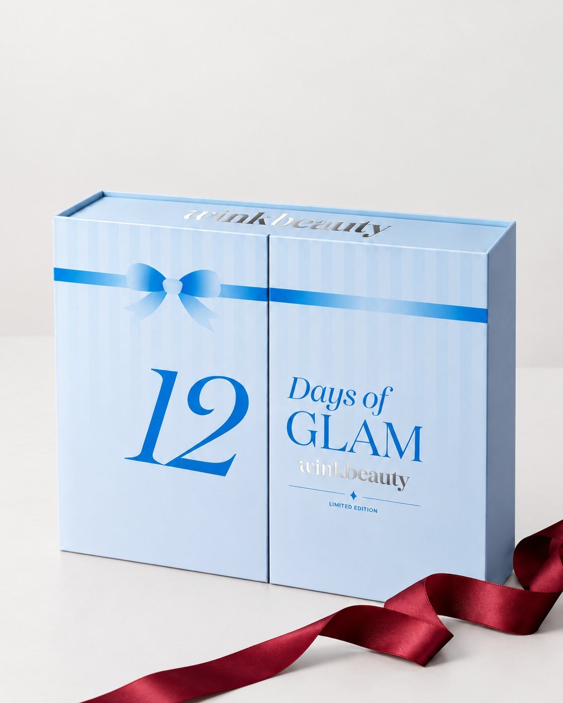 Zamknięte pudełko 12 Days of GLAM z bordową wstążką
